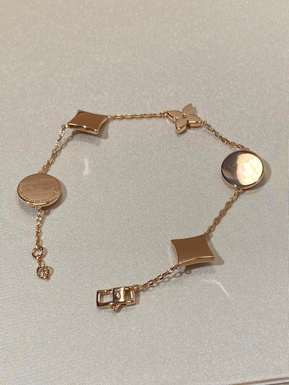 [Lucky Star]STAR AND SUN 5 MOTIF MOP PINK GOLD BRACELET