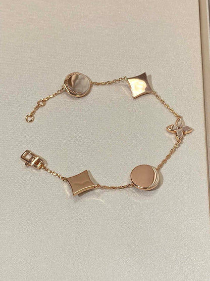 [Lucky Star]STAR AND SUN 5 MOTIF MOP PINK GOLD BRACELET