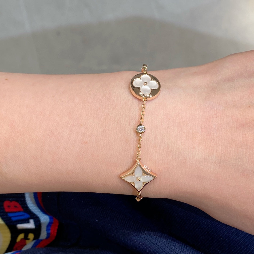 [Lucky Star]STAR AND SUN 4 MOTIF WHITE MOP PINK GOLD BRACELET