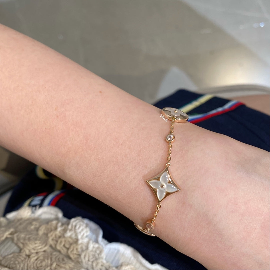 [Lucky Star]STAR AND SUN 4 MOTIF WHITE MOP PINK GOLD BRACELET