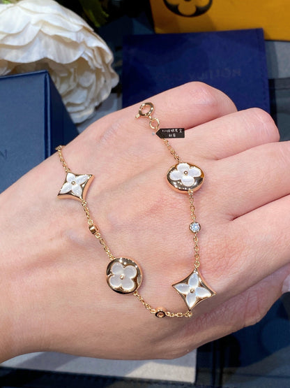 [Lucky Star]STAR AND SUN 4 MOTIF WHITE MOP PINK GOLD BRACELET