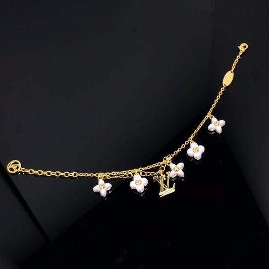 [Lucky Star]LOGO 6 MOTIF STAR AND SUN GOLD BRACELET