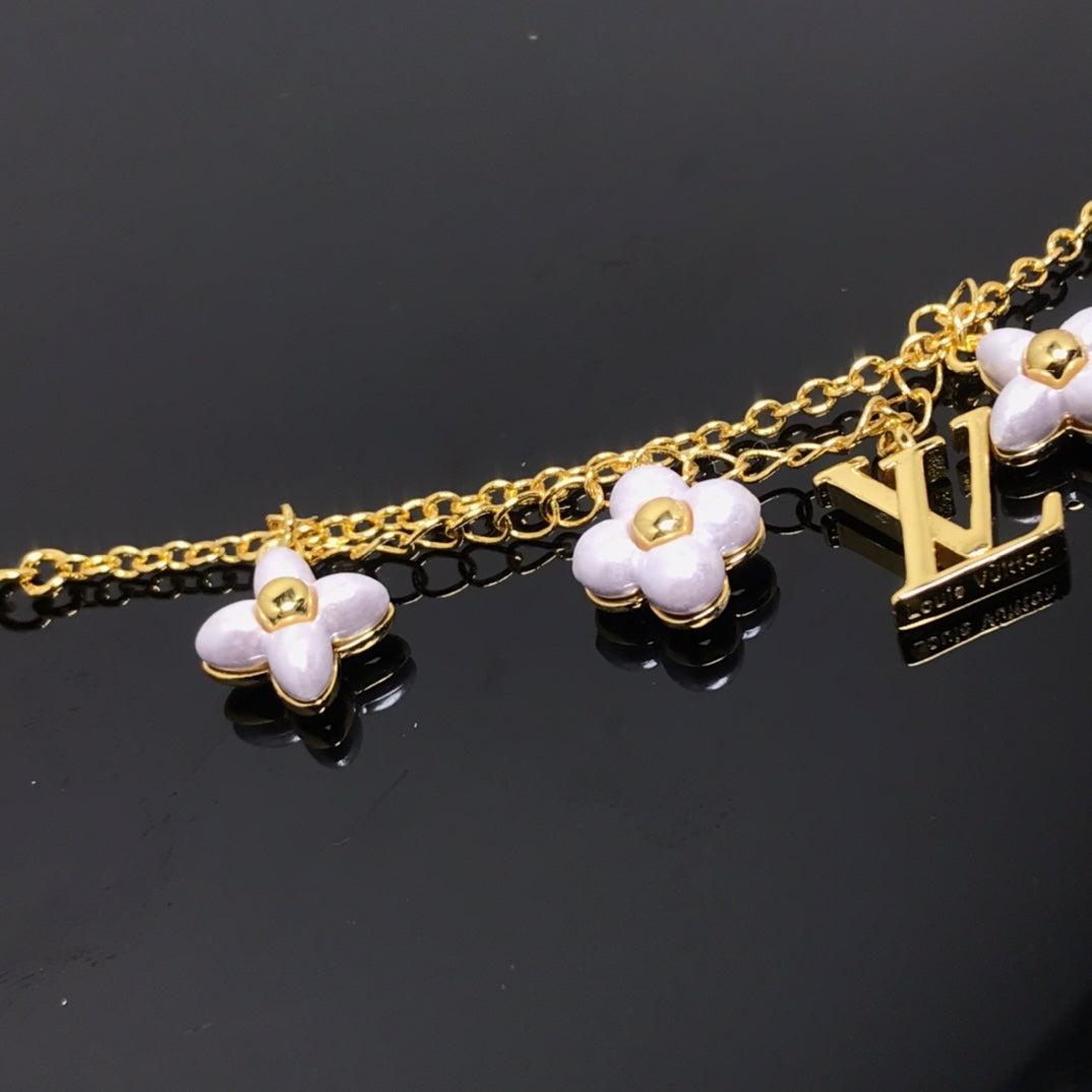 [Lucky Star]LOGO 6 MOTIF STAR AND SUN GOLD BRACELET