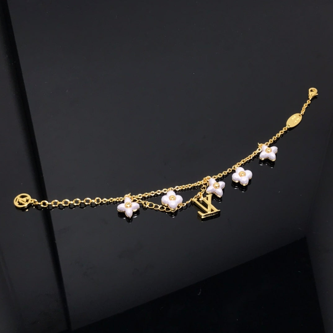 [Lucky Star]LOGO 6 MOTIF STAR AND SUN GOLD BRACELET